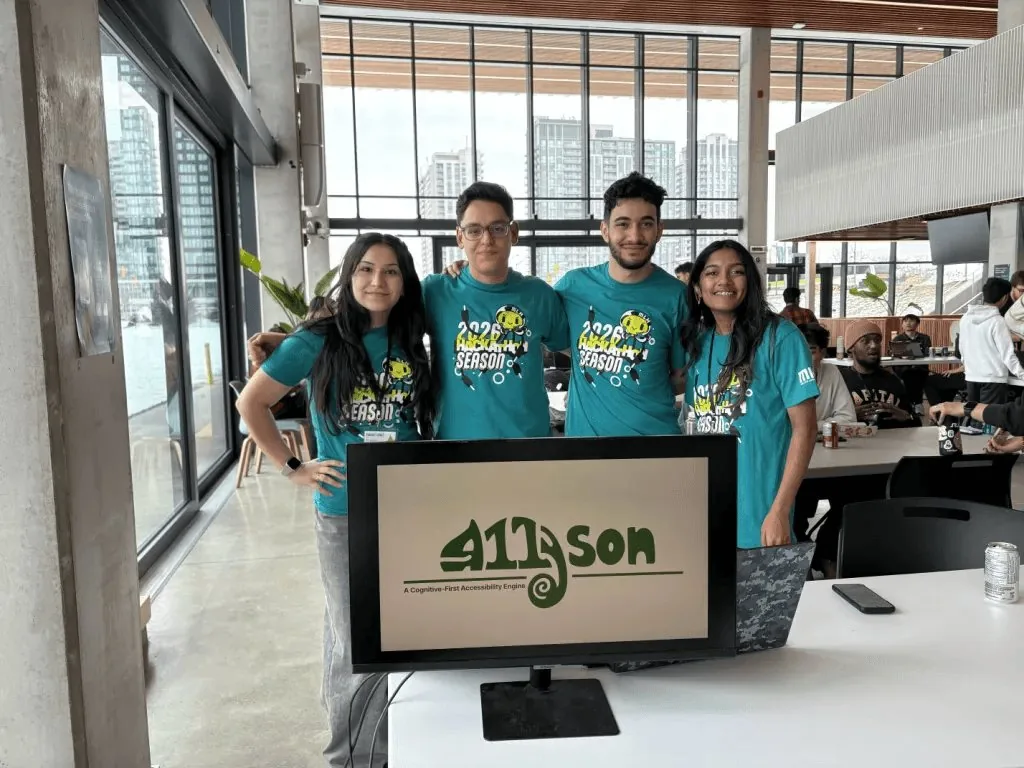 The A11yson team at Hackville 2026 with the logo on screen